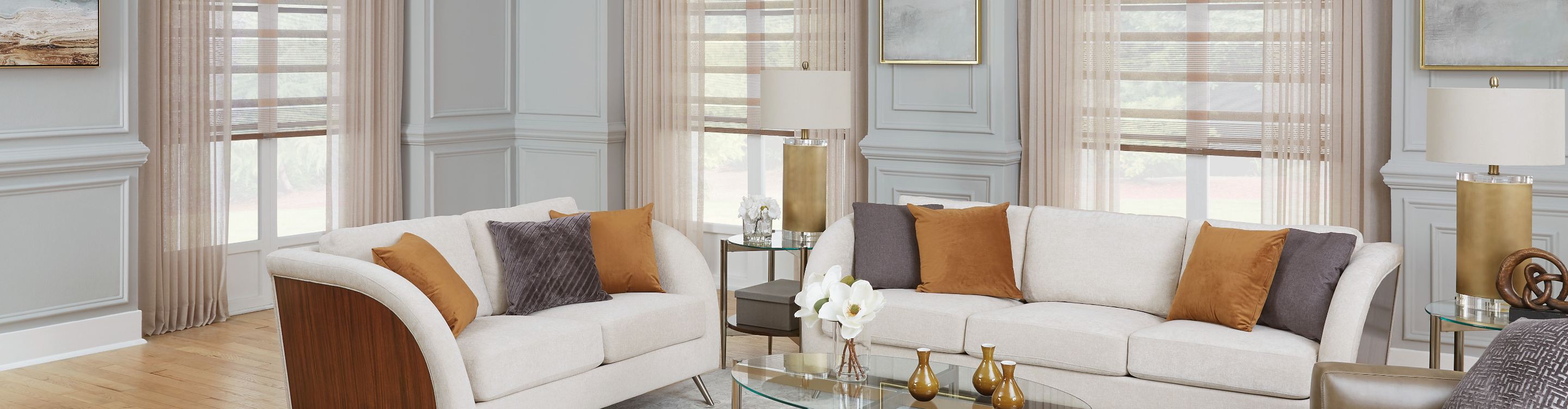 sheer curtains and blinds in living room area with wood flooring